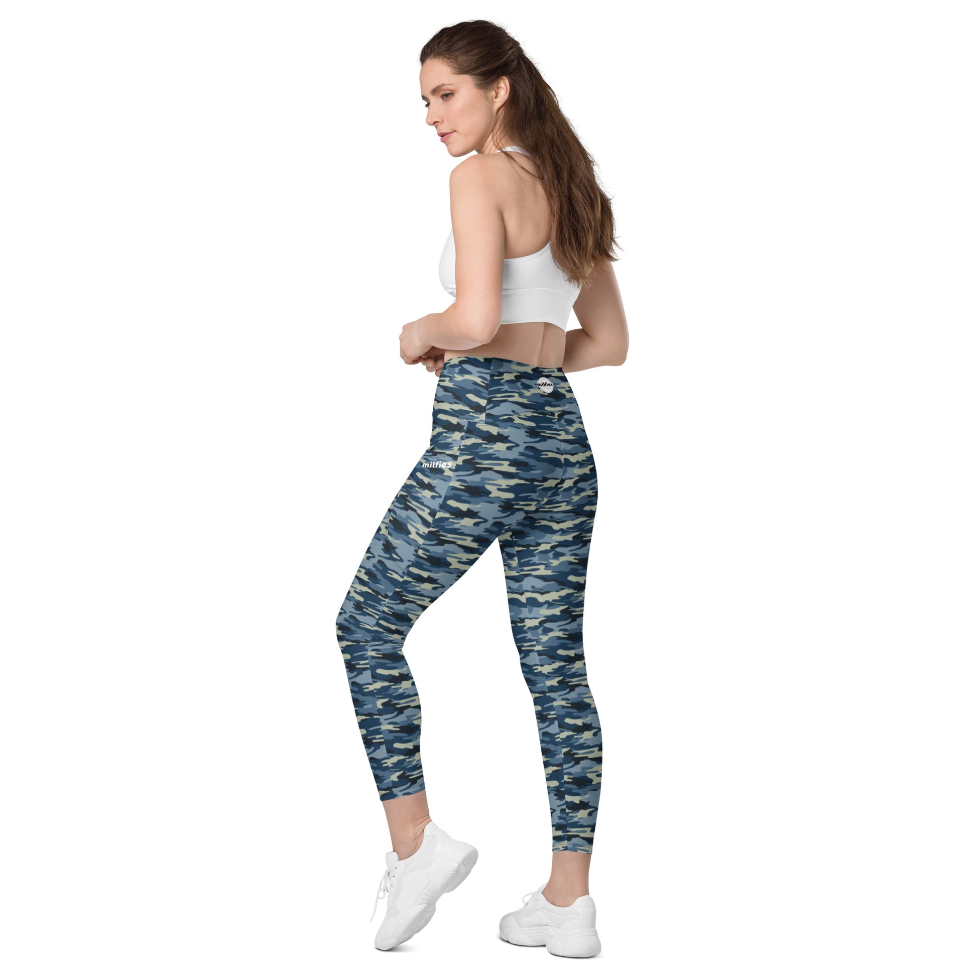 https://milfiesactivewear.com/cdn/shop/products/all-over-print-leggings-with-pockets-white-left-back-63950a36f3207.jpg?v=1670711889&width=1946